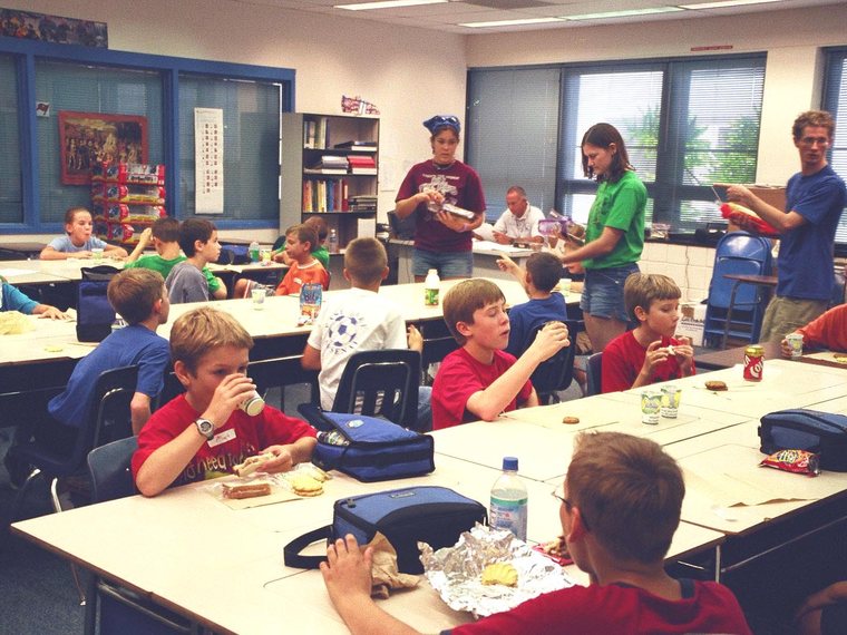 Kids learning robotics at a Krunch summer camp