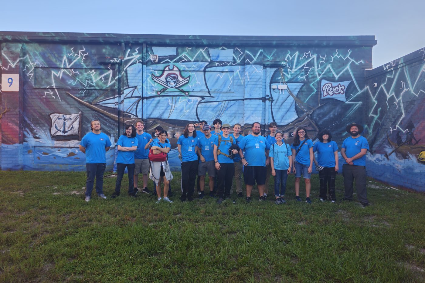 Team 79 Krunch students celebrating together after winning the Space Coast Showdown regional