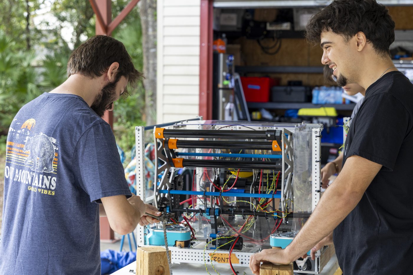 Team 79 Krunch members building the competition robot