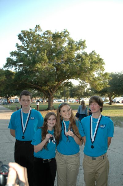 Team 79 Krunch students wearing county recognition medals