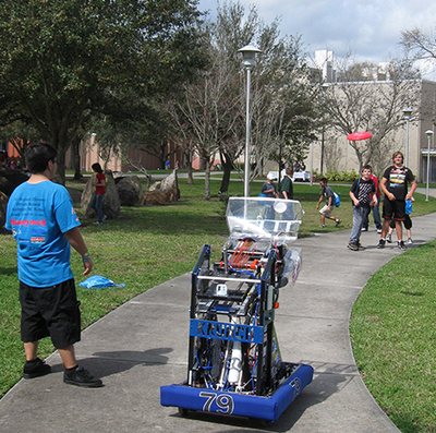Team 79 Krunch demonstrating their robot outdoors at the USF Engineering Expo