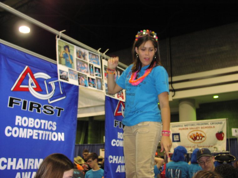 Team 79 Krunch on stage with the FIRST Chairman's Award banner at the 2004 Championship