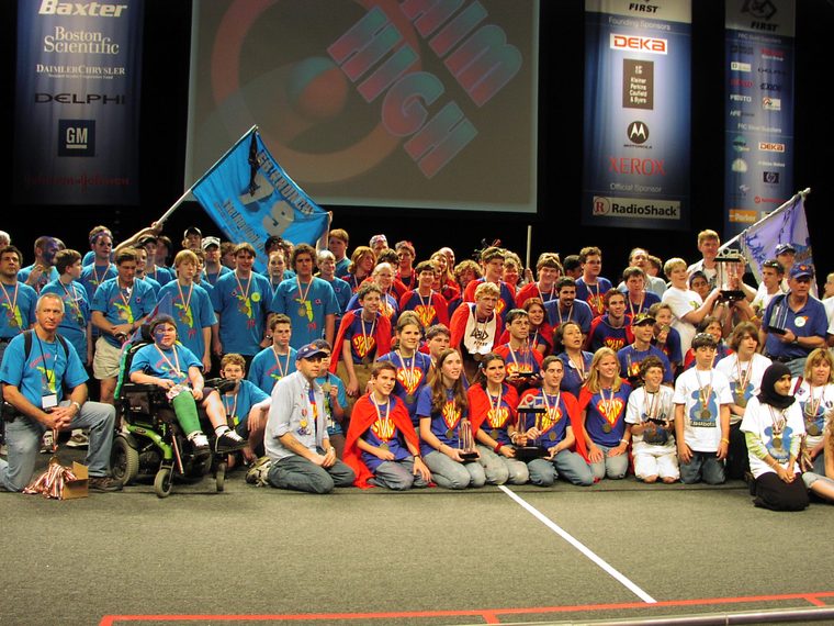Team 79 Krunch with their winning alliance on the field at the 2006 Florida Regional